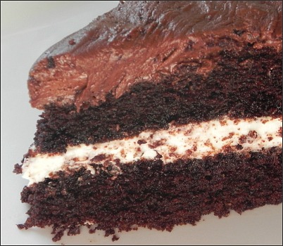 Marshmallow Filled Chocolate Cake With Chocolate Syrup Icing