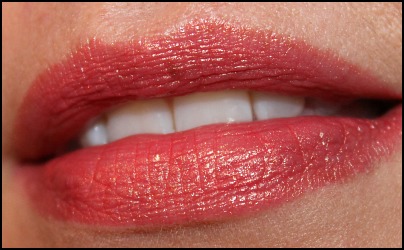 Laura Mercier Shimmer Lipstick swatch in Coral